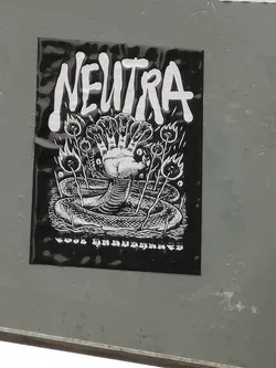 Street sticker The sticker is a rectangular, black and white design. At the top, the word "NEUTRA" is prominently displayed in a bold, distressed white font against a black background. The central illustration features a large, coiled snake with multiple heads, from which a human-like fist emerges. The snake's scales are intricately detailed. Surrounding the snake and fist are several thin, plant-like stalks, each topped with a stylized flame or burning orb. The artwork has a strong, high-contrast, illustrative style, reminiscent of woodcut or linocut prints, with white lines defining elements against a dark, textured background. There is a small, unreadable line of text or symbols at the very bottom.
