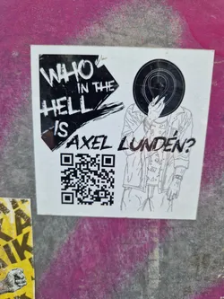 Street sticker Black and white sticker featuring a stylized illustration of a person with a record covering their face. Text on the sticker reads: "Who in the Hell is Axel Lunden?" and includes a QR code.