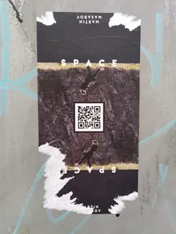 A sticker featuring a person seemingly floating in space, with the word 'SPACE' written above and below. The design is minimalistic and uses a dark color palette. It includes a QR code that likely links to the artist's website or social media.