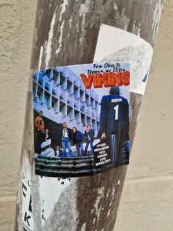 Street sticker A sticker featuring a photo of a group of people standing on some stairs in front of a building.  The text 'Viking' is prominently displayed, along with information indicating a first-place finish in "Brønnøysund 2018", a cup win in 2019, and a bronze medal in 2021.  The overall aesthetic suggests a sports or team-related theme.
