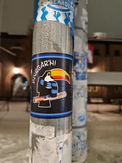 Street sticker A sticker featuring a toucan holding what looks like a kanelbulle (a Swedish cinnamon bun). The text on the sticker says "Djurgå'rh!" which is a playful take on Djurgården, an island and a popular park in Stockholm, Sweden. The style is simple, cute, and slightly humorous.