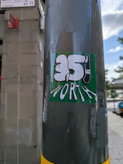 Street sticker A square green sticker featuring the number '35' in large white bubble letters, with a black skateboard graphic forming the 'th'. Below, the word 'NORTH' is written in a jagged, stylized white font.