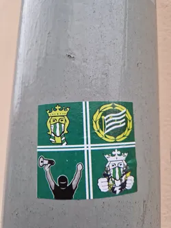 This sticker is divided into four quadrants, each containing a distinct graphic. The top-left quadrant shows a crowned figure wearing a green and white striped scarf around their neck and face, reminiscent of a football fan. The top-right features a circular emblem with a flag-like design within a laurel wreath. The bottom-left displays a figure raising their arms in celebration, holding a megaphone. Finally, the bottom-right quadrant shows another crowned figure with their fists clenched, also wearing a similar green and white scarf. The style suggests a connection to a specific team or club, possibly football-related.