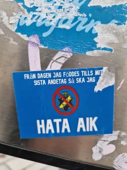 A blue square sticker with the text "From the day I was born until my last breath I will hate AIK" in Swedish. There is a symbol of AIK crossed out in a red circle. 