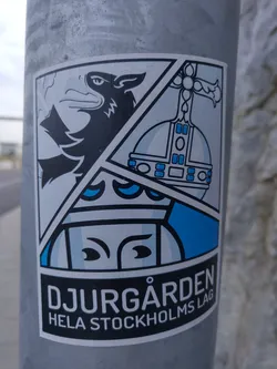 A sticker with a segmented design showcasing different elements of the Djurgården emblem. It features a wolf's head, a crown, and a cross, all in a minimalist, stylized way. The text 'DJURGÅRDEN HELA STOCKHOLMS LAG' is visible at the bottom, which translates to 'Djurgården, the whole Stockholm team'.