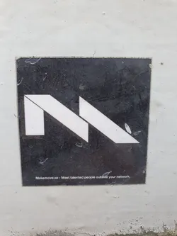 A black and white sticker with a stylized letter 'N' and the text 'Makemove.se - Meet talented people outside your network'.