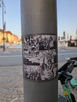 Street sticker The sticker is a collage of black and white photographs, arranged in a grid-like fashion. The top section shows energetic fans with raised arms and banners, some featuring text. The middle section prominently displays the word 'HAMMARBY' in large, bold lettering, below which are images of a car and more cheering spectators. The bottom section depicts large crowds of people, likely fans, with the text 'VI HAR SÅNG PÅ LAKTARN SEDAN 1970' visible. The overall aesthetic is retro and celebratory, evoking a sense of historical fan culture.