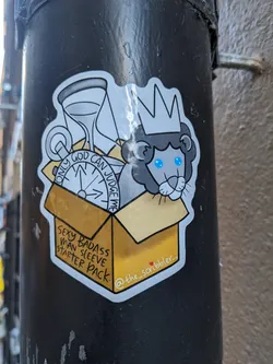 Sticker featuring a crowned lion in a box with a compass, hourglass and the text "Only God can judge me".