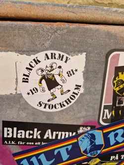 Street sticker A round sticker featuring a cartoon rat wearing a jersey. The text on the sticker says 'Black Army' '19' '81*' and 'Stockholm'.