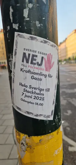Street sticker This sticker on a utility pole is for a demonstration against genocide in Gaza. The poster features the slogan "Sverige Säger NEJ Till Folkmord", and calls for people all over Sweden to gather in Stockholm on June 7, 2025, at Odenplan at 14.00.