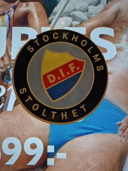 Street sticker A round sticker featuring the logo of Stockholm D.I.F., a Swedish club. The logo is a shield with the letters D.I.F. in the center, set against a gray background with the words "Stockholms Stolthet" (Stockholm Pride) around the edge.