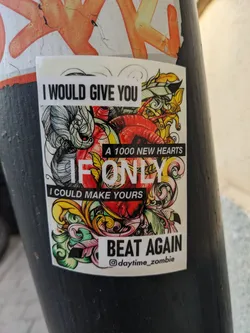 Street sticker A sticker with an illustration of a heart and ornate design. The text on the sticker is a romantic message.