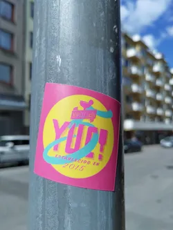 Street sticker Pink and yellow sticker with the word YUCA in a stylized font. It also says "Establecido en 2015" (Established in 2015) at the bottom. There's a small illustration of what looks like a cocktail shaker at the top.