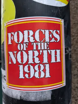 Street sticker A red and yellow sticker with the text "Forces of the North 1981" in a bold, white, stencil-like font. The sticker has a simple, rectangular design with a thin yellow and white border.