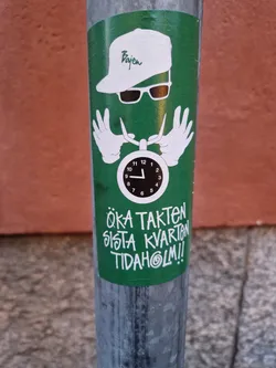 Street sticker A green sticker featuring a unique design. The central figure has a "Bajen" branded cap and sunglasses, hands forming the shape of a clock's hands. The text below translates roughly to: "Increase the pace last quarter Tidaholm!!"