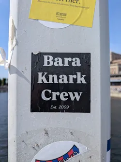 Street sticker A square black sticker featuring bold white serif text that reads 'Bara Knark Crew' with 'Est. 2009' printed in a smaller font at the bottom.