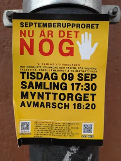 Street sticker The sticker is predominantly bright yellow with bold, black and red text. At the top, it reads 'SEPTEMBERUPPRORET' in black. Below that, 'NU ÄR DET' is in red, followed by a large red 'NOG' and a white open palm graphic. The middle section lists reasons for gathering: 'VI SAMLAS VID RIKSDAGEN MOT KRIGSHETS, FOLKMORD OCH RASISM, FÖR VÄLFÄRD, PALESTINA, FRED, JÄMLIKHET & KLIMATRÄTTSVISA'. The date and time are clearly stated: 'TISDAG 09 SEP SAMLING 17:30 MYNTTORGET AVMARSCH 18:20'. The bottom section contains two QR codes, one with text '123-522 71 45 STÖTTA OSS' and the other with 'LÄS MER'. Below the QR codes, there is a block of smaller text detailing the purpose of the protest.