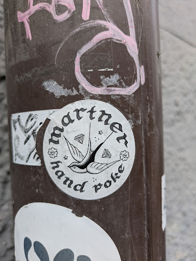 Street sticker Stockholm POLI martners hand roke