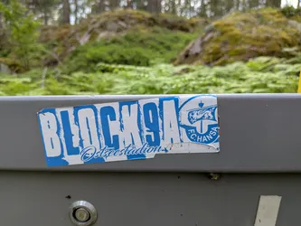 Street sticker A rectangular blue and white sticker. It features the bold, distressed text 'BLOCK 9A' with 'Ostseestadion' in cursive below. The right side displays the F.C. Hansa Rostock sailing ship logo.