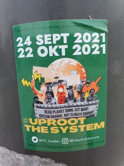 Street sticker A green sticker promoting climate action with images of a protest and the dates 24 Sept 2021 and 22 Oct 2021.  It includes the text "Dead Planet Soon, Act Now! System Change, Not Climate Change!" and the hashtag #UprootTheSystem. Social media handles for @FFF_Sweden (Twitter) and @fridaysforfuture.swe (Instagram) are also included.