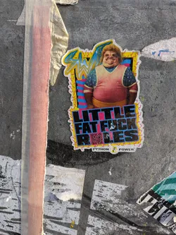 Street sticker A sticker featuring a cartoon of an overweight man in 80s workout attire with the text "Little Fat Fuck Rules" underneath.  The sticker also includes stylized text at the top and "PYTHON POWER" at the bottom.