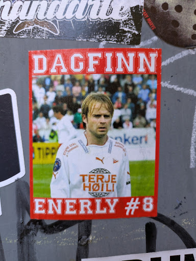 A sticker shows Dagfinn Enerly wearing a football jersey. The sticker has a red border and the text "Dagfinn ENERLY #8".