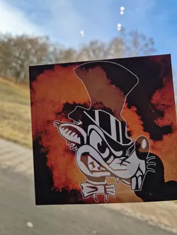 Street sticker This sticker features a stylized rat wearing a top hat, set against a fiery orange and black background. The rat's expression is mischievous, and the overall style is reminiscent of vintage cartoons or illustrations.