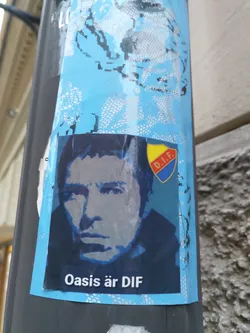 A sticker featuring a stylized portrait of Liam Gallagher, the lead singer of Oasis, superimposed over a blue background.  A crest with the initials "D.I.F." is also present. The text at the bottom translates from Swedish to "Oasis is DIF".