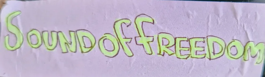 A sticker with the text \"Sound of Freedom\" written in a hand-drawn style with a light green/yellow color on a pale pink background.