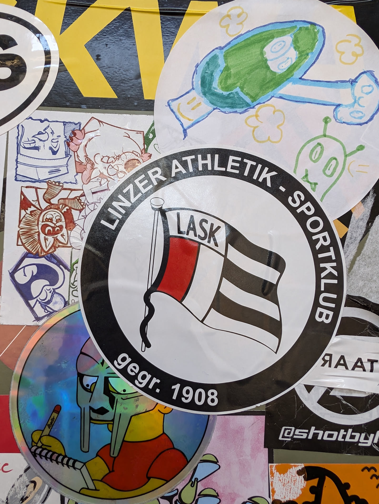 A round sticker featuring the logo of Linzer Athletik Sportklub (LASK), an Austrian football club. The logo includes a flag with red and black horizontal stripes. The text around the logo says "LINZER ATHLETIK SPORTKLUB" and "gegr. 1908", which means "founded in 1908".