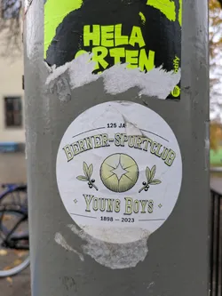 A round sticker commemorating the 125th anniversary of Berner Sport Club Young Boys, featuring a vintage-style logo with olive branches and a central emblem. The years 1898-2023 are prominently displayed.