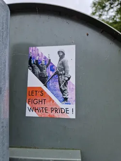 A sticker featuring a black and white image of soldiers with the text 'Let's Fight White Pride!' superimposed. The image is stylized with color blocks in purple, orange and white.