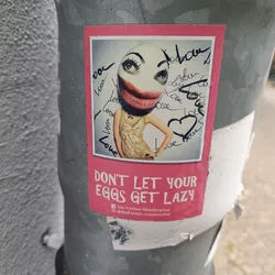 A sticker featuring a collage of a woman's face and body with a bold message. The style is quirky and slightly surreal.