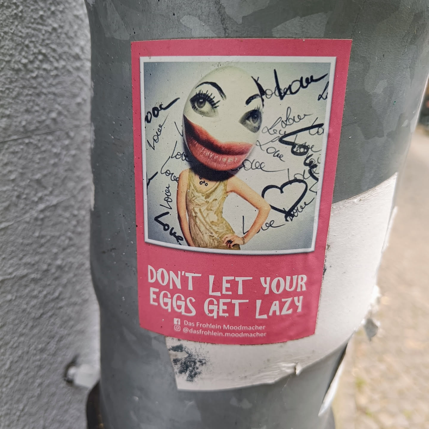 A sticker featuring a collage of a woman's face and body with a bold message. The style is quirky and slightly surreal.