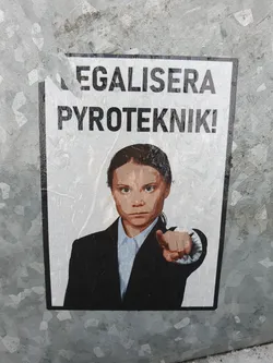 A sticker featuring Greta Thunberg pointing at the viewer with text that says "Legalisera Pyroteknik!" which translates to "Legalise Pyrotechnics!" in Swedish.