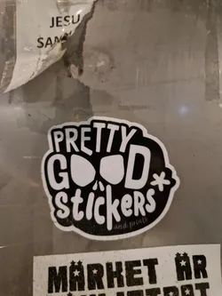 Black and white sticker with the text "Pretty Good Stickers" and "and prints" in smaller font. The style is hand-drawn with a slightly grunge aesthetic.