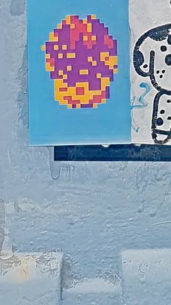 A pixel art style sticker of a mushroom with a purple cap and yellow spots, set against a light blue background.