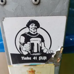 Black and white sticker of a man in medieval clothing holding a beer mug. The text below says "Make 41 fun".