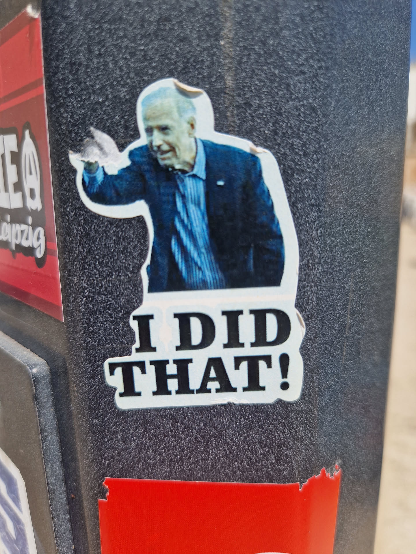 A sticker featuring a photo of President Joe Biden and the text "I DID THAT!"