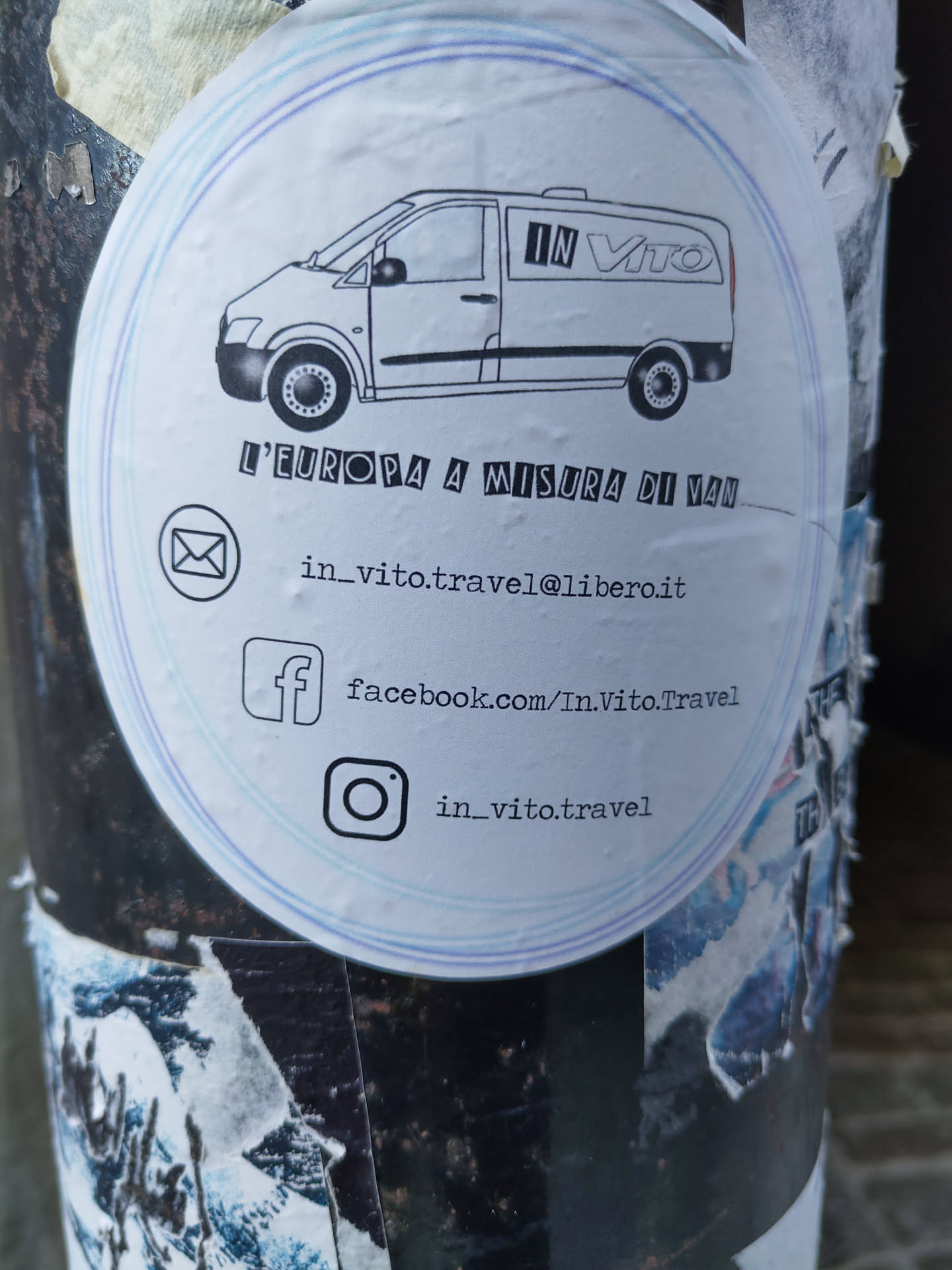 Sticker for In Vito travel agency.  It depicts a van and includes contact information: email, Facebook, and Instagram.