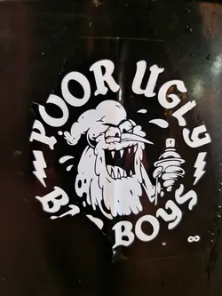 Black and white sticker with an illustration of a monster holding a spray can. The text "Poor Ugly Boys" is written around the illustration.