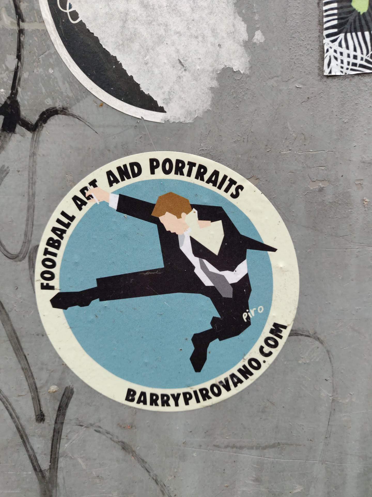 Round sticker featuring a stylized illustration of a man in a suit mid-leap. The artwork has a retro feel with bold lines and simple color palette. The sticker's text includes the artist's name and website.
