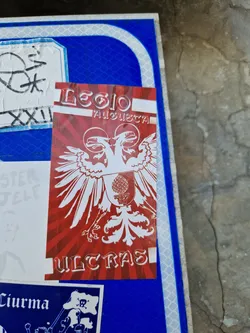 A sticker featuring a red and white design with a double-headed eagle and the text 'Legio Augusta' and 'Ultras'.