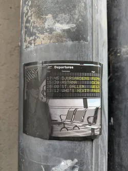 Black and white sticker depicting a person waiting at an airport, with a departures board in the background showing various destinations and flight numbers. The sticker has a slightly gritty, urban feel.