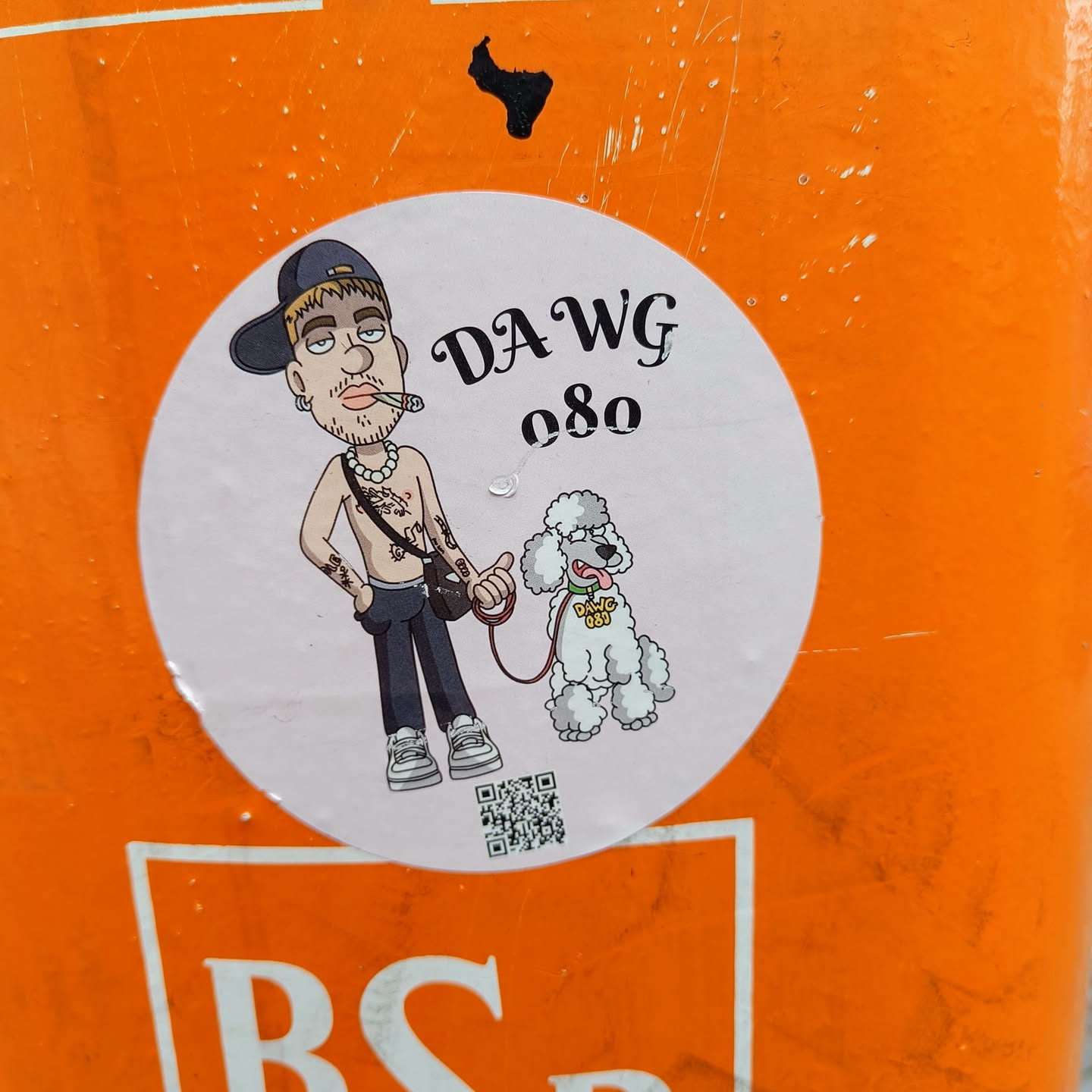 A sticker featuring a cartoon illustration of a man with tattoos, wearing a cap and holding a leash attached to a poodle. The man is smoking. The text 'DAWG 080' is prominently displayed.