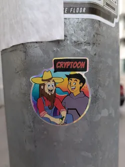 This sticker shows two cartoon characters. The left character has a long beard, overalls, and a cowboy hat. He is holding a bottle. The right character wears a hoodie. Above them reads "CRYPTOON". The sticker has a colorful, rainbow effect background.