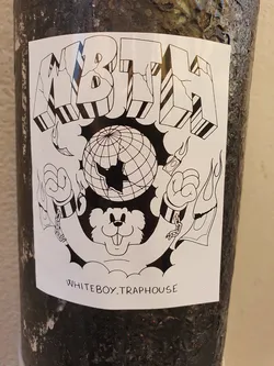 Black and white illustration sticker featuring the text MBTH, a globe with cracks, and a bear-like figure in chains. The text 'WHITEBOY.TRAPHOUSE' is visible at the bottom.