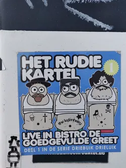 Sticker featuring three cartoon characters with tattoos, announcing a live event at Bistro de Goedgevulde Greet.  This is part 1 of a three-part series.