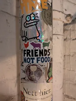 A die-cut sticker featuring three colorful silhouettes of farm animals standing in a line: a red chicken on the left, a purple pig in the center, and a green cow on the right. Below the animals, the bold text reads 'FRIENDS' in black capital letters stacked above 'NOT FOOD' in dark blue capital letters, all surrounded by a white die-cut border.