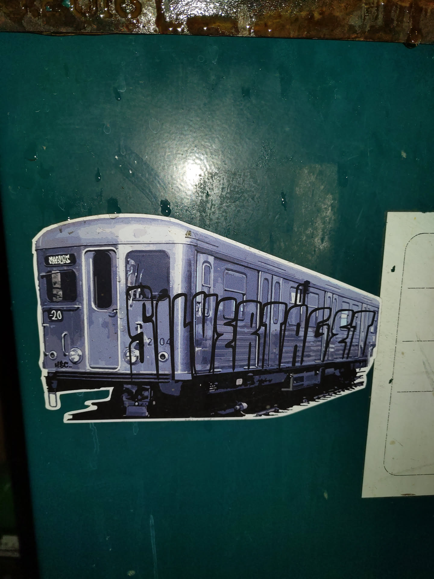 A sticker featuring a stylized illustration of a Silver Line train. The design incorporates graffiti-style lettering along the side of the train.